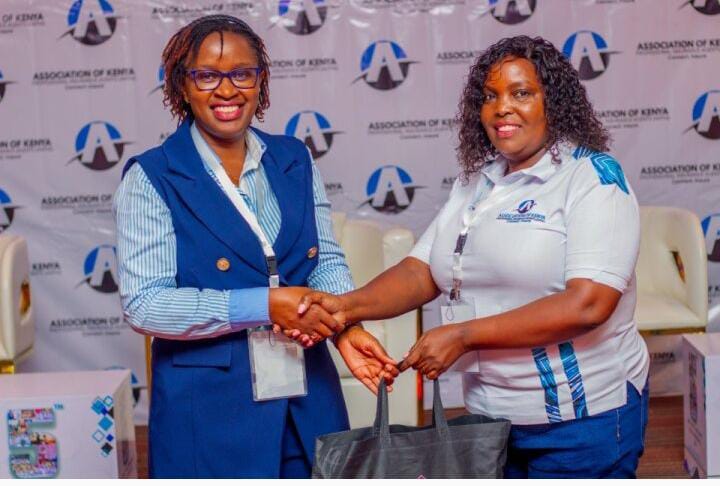 Maggie appreciating Ms. Mercy Wambua, CEO Commission for Administration of Justice